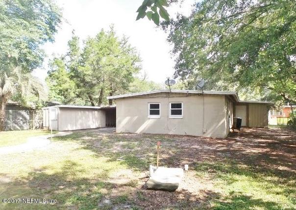 7022 Rollo Road Jacksonville, FL 32205 - Photo 10 of 10 a view of a house with a yard