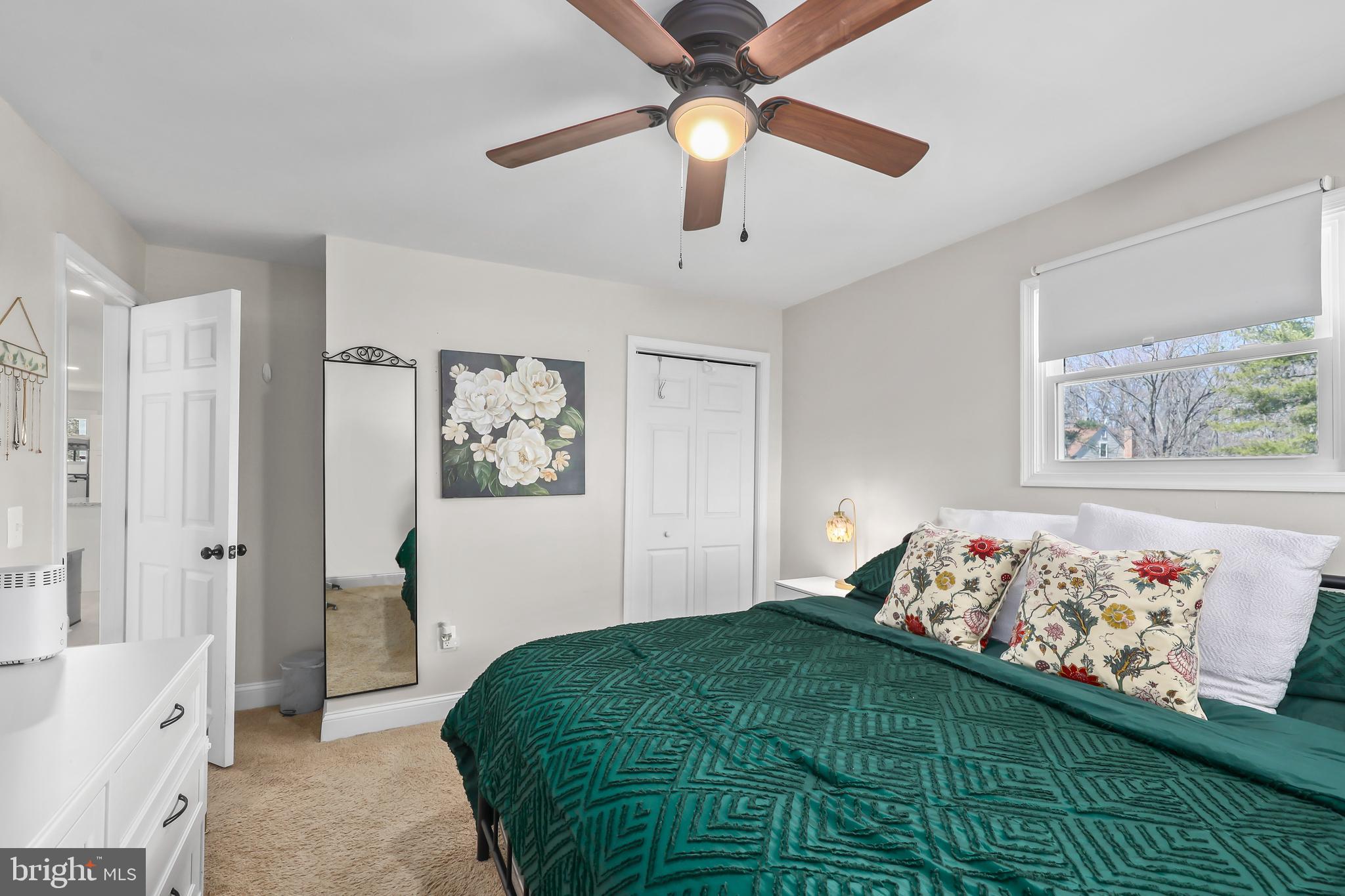 379 Ferry Road Fredericksburg, VA 22405 - Photo 15 of 33 a bedroom with a bed and a painting on the wall
