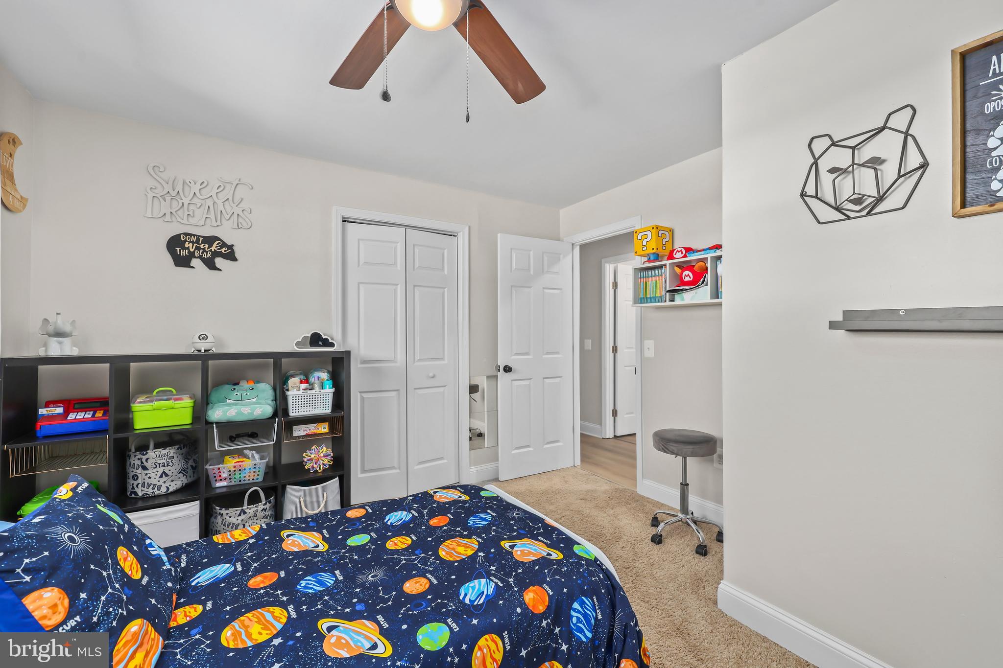 379 Ferry Road Fredericksburg, VA 22405 - Photo 19 of 33 a bedroom with a bed and a chandelier