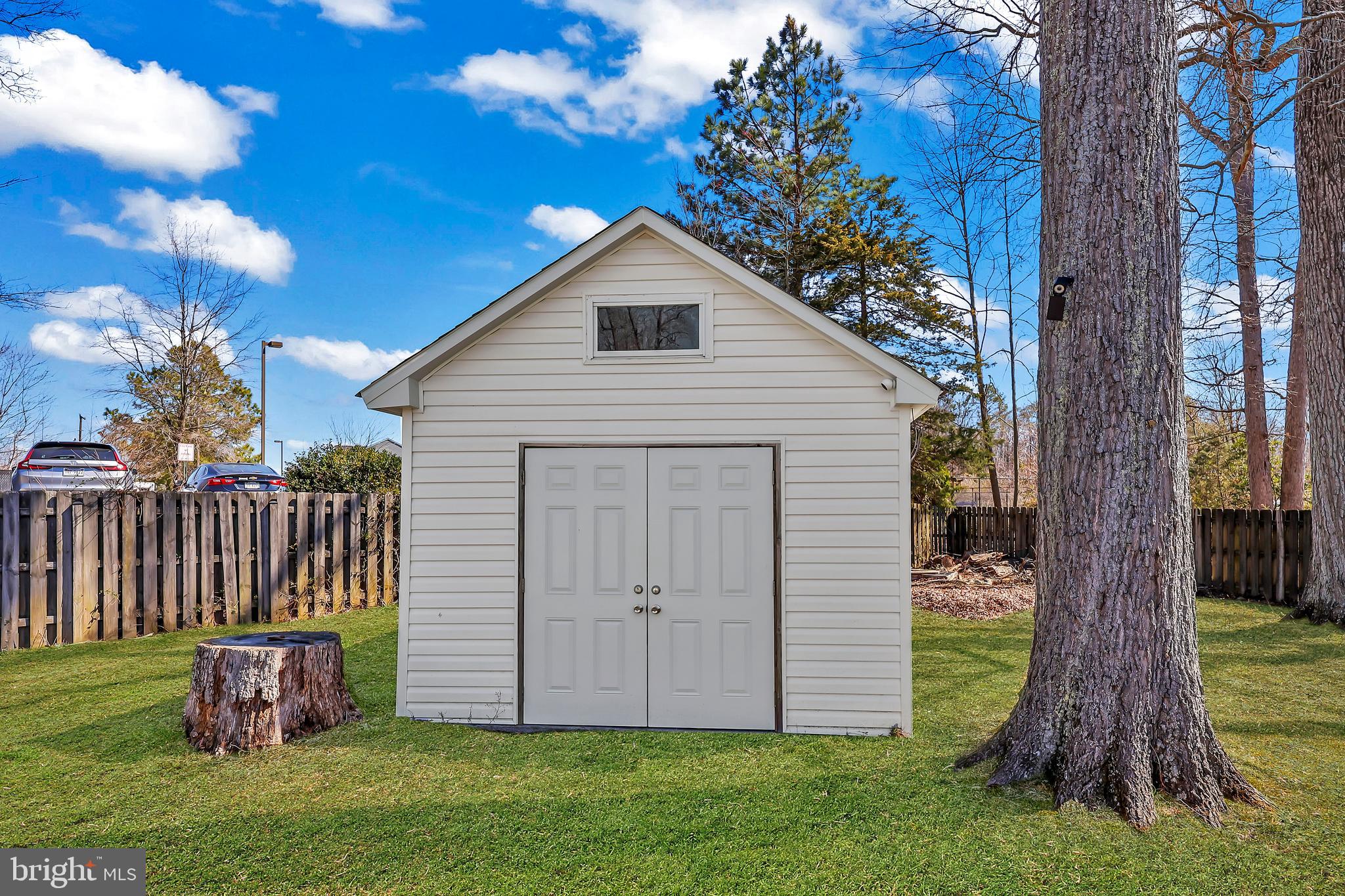 379 Ferry Road Fredericksburg, VA 22405 - Photo 29 of 33 a view of backyard with a barn and a large tree