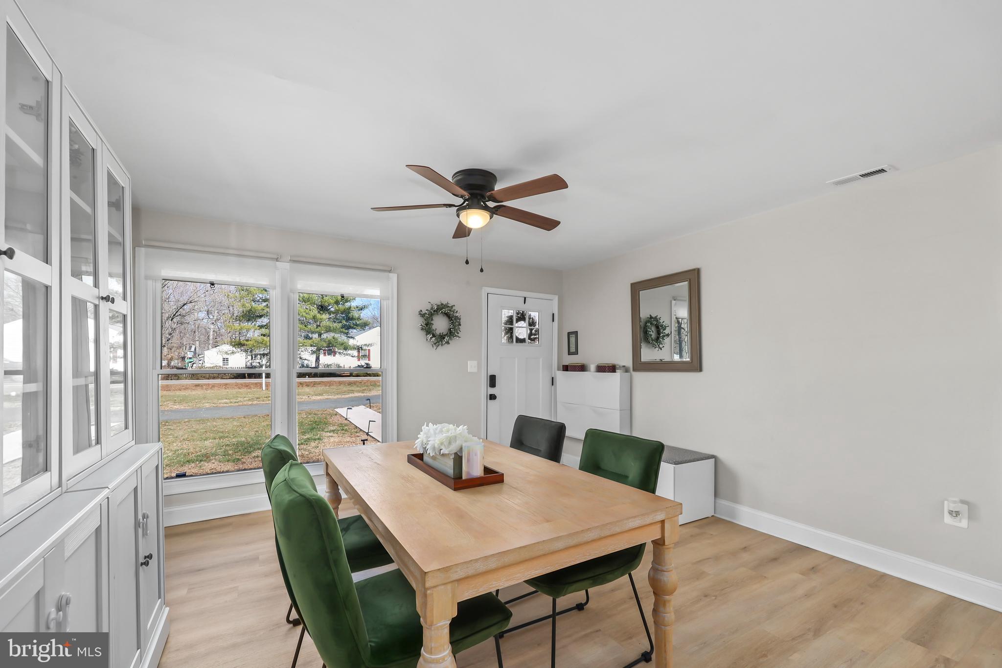 379 Ferry Road Fredericksburg, VA 22405 - Photo 7 of 33 a view of a dining room with furniture window and outside view