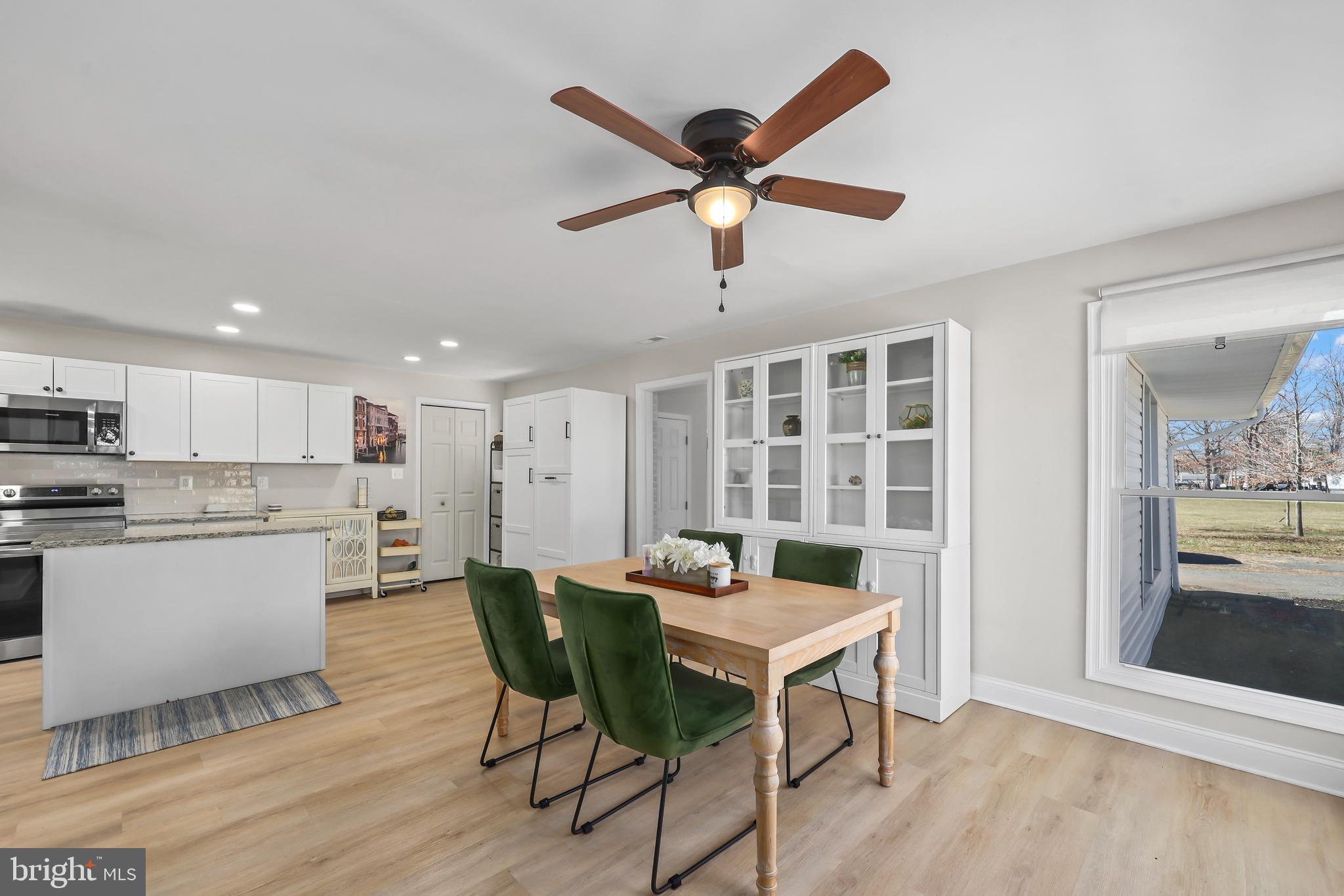 379 Ferry Road Fredericksburg, VA 22405 - Photo 8 of 33 a workspace with furniture and a kitchen