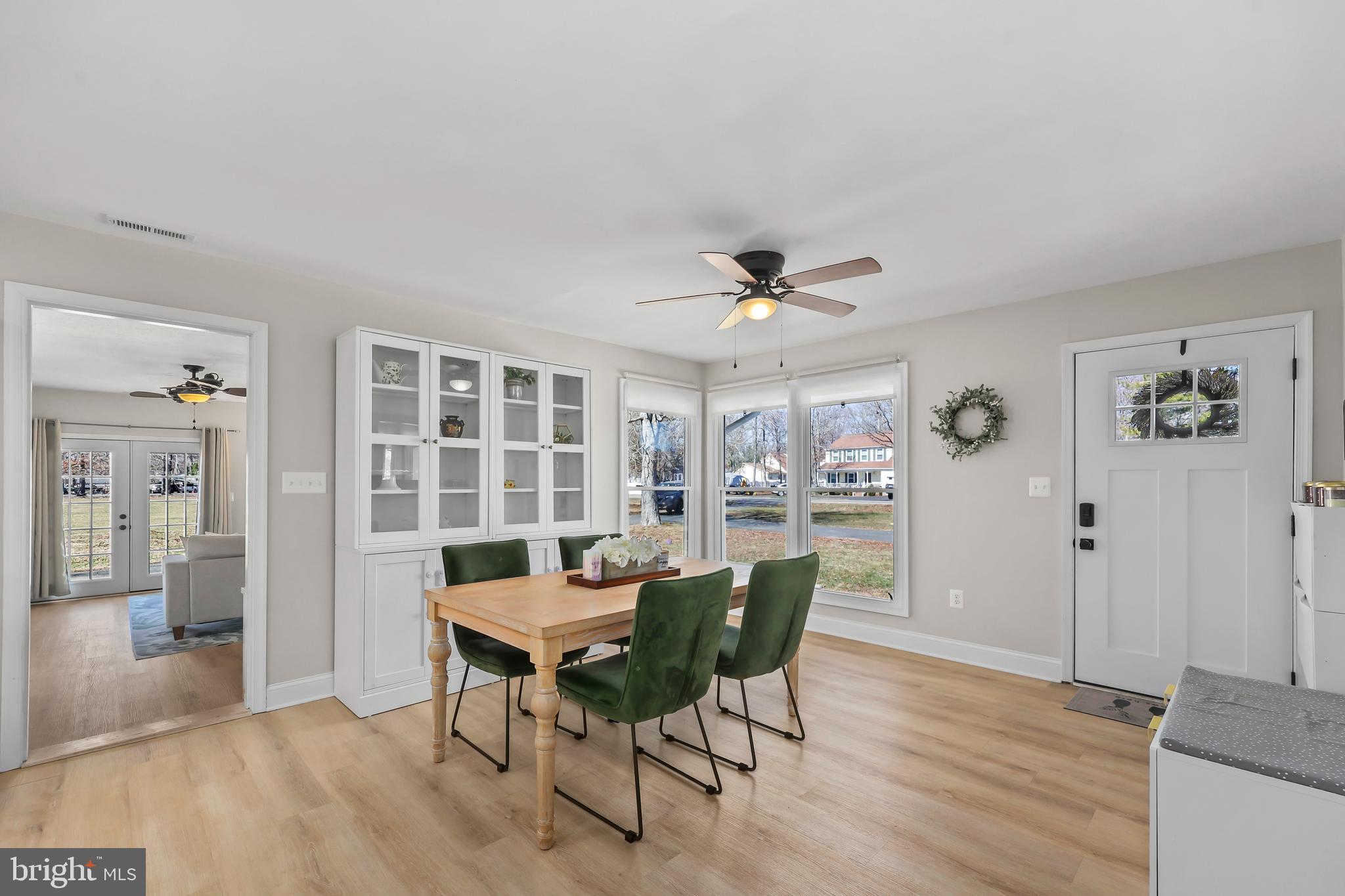 379 Ferry Road Fredericksburg, VA 22405 - Photo 9 of 33 a workspace with furniture wooden floor and a rug
