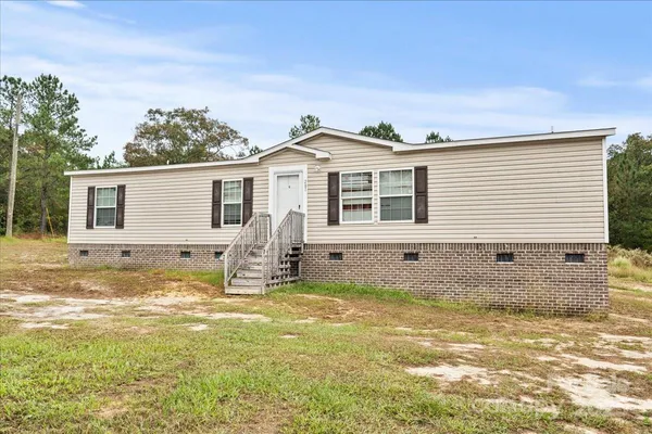 a view of a house with a swimming pool