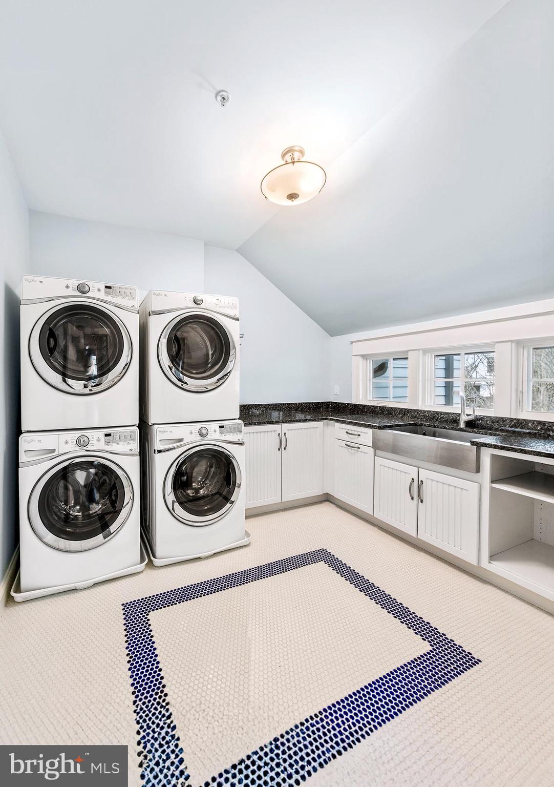 7221 Ridgewood Terrace Chevy Chase, MD 20815 - Photo 62 of 76 Laundry Room with double stacked washer/dryers