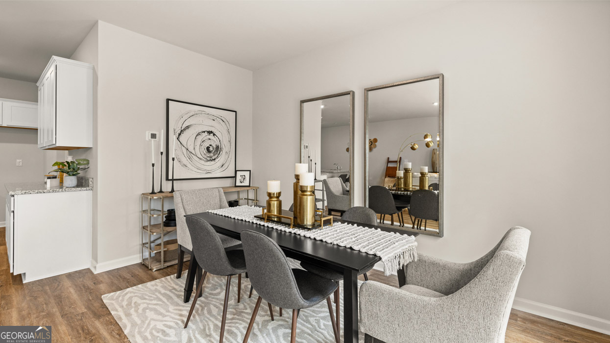 241 Sound Circle Stockbridge, GA 30281 - Photo 34 of 64 a view of a dining room with furniture
