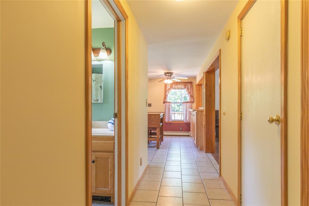 235 Dirigo Road China, ME 04358 - Photo 10 of 35 Beautiful tile flooring in hallway...