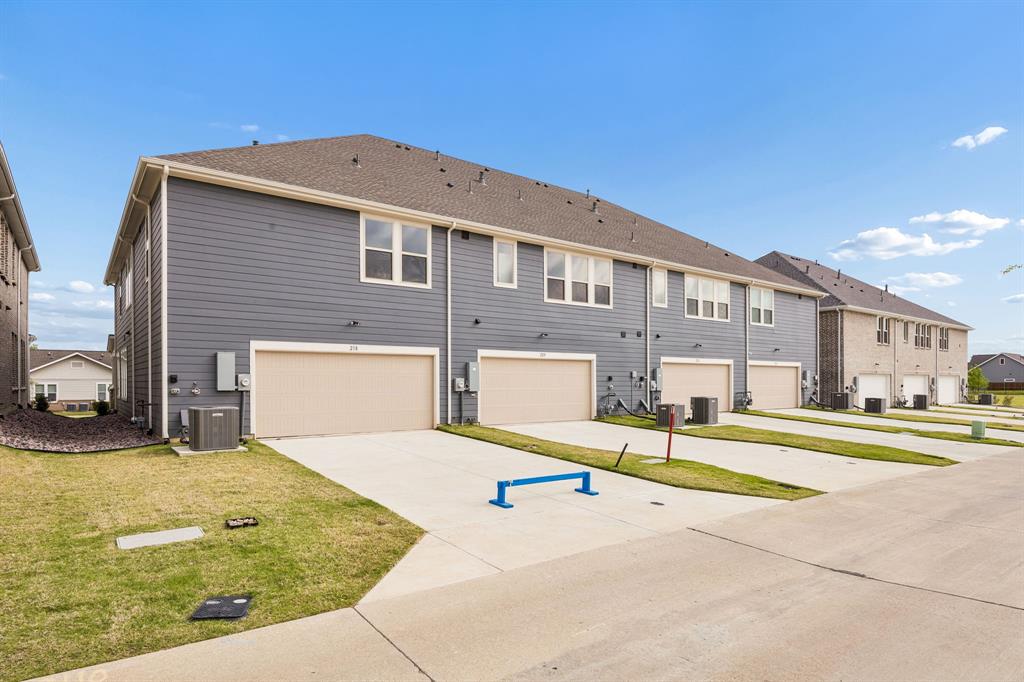 218 Dylan Way Midlothian, TX 76065 - Photo 13 of 15 With an oversized garage and perfectly sized drive, you'll enjoy ample off street parking in this dream home!