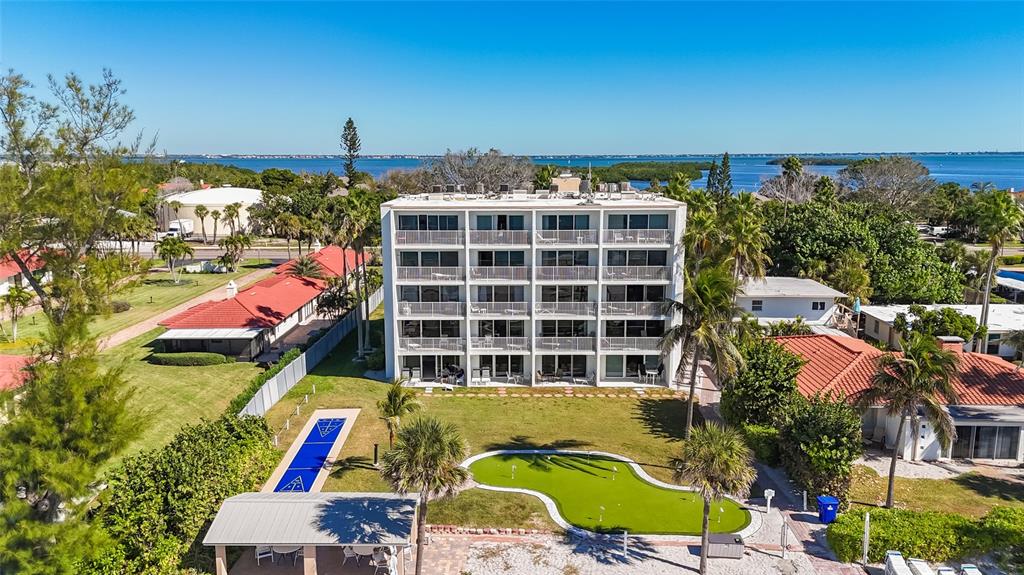 4235 Gulf Of Mexico Drive, Unit T203 Longboat Key, FL 34228 - Photo 1 of 1 a view of a city with tall buildings
