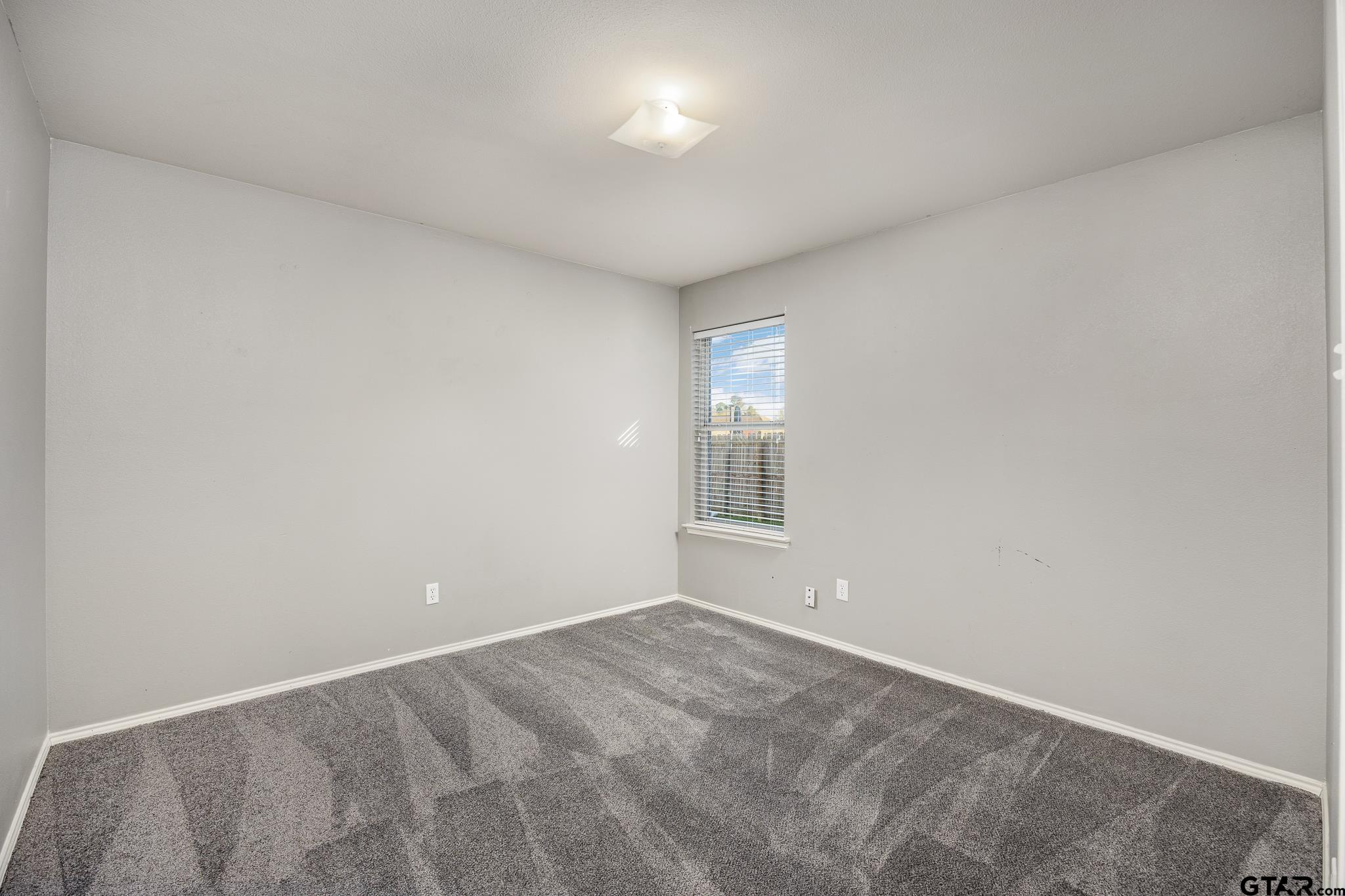 7000 Ranch Hill Drive Flint, TX 75762 - Photo 16 of 25 a view of an empty room with a window