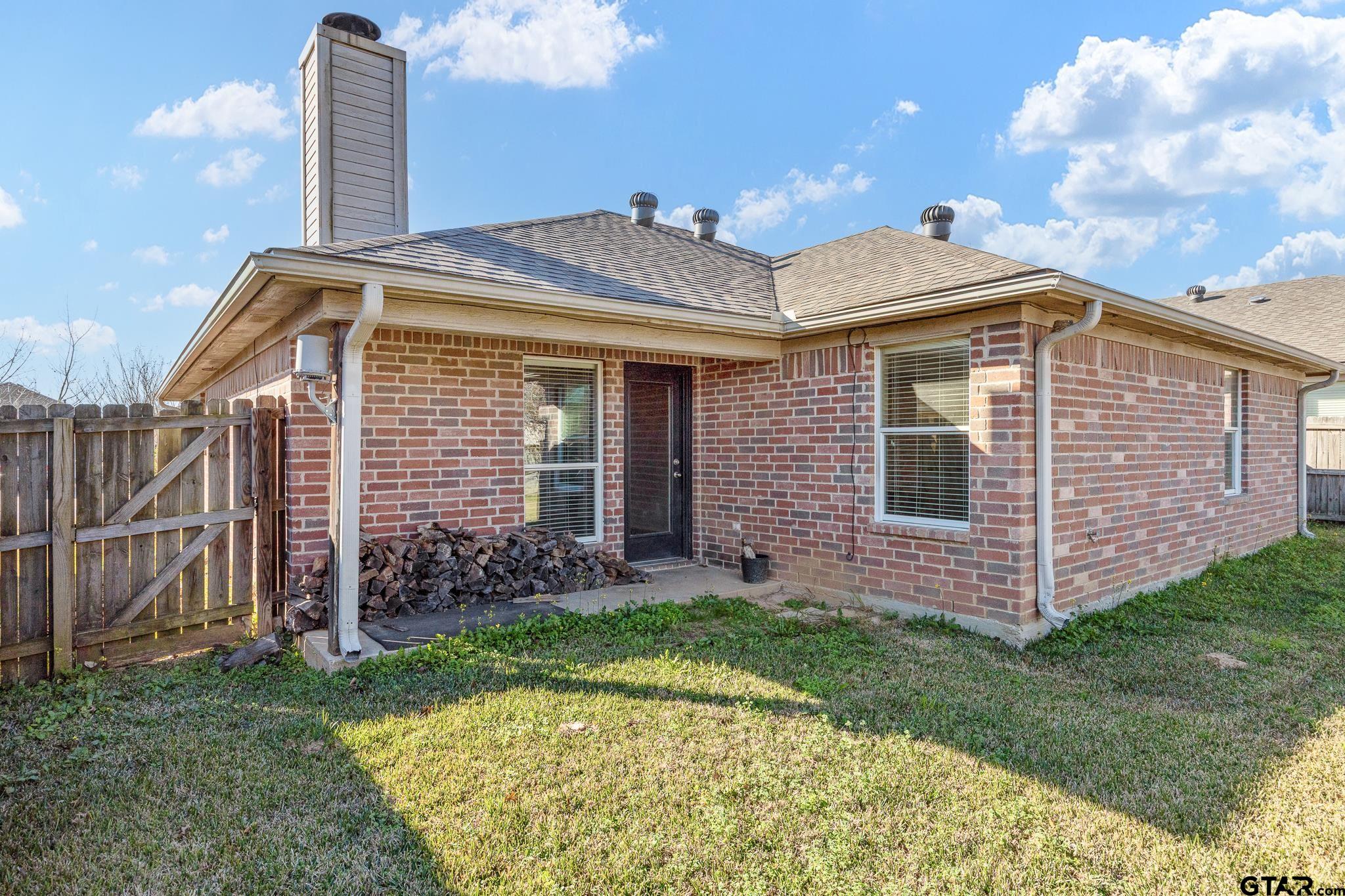 7000 Ranch Hill Drive Flint, TX 75762 - Photo 22 of 25 a front view of a house with garden