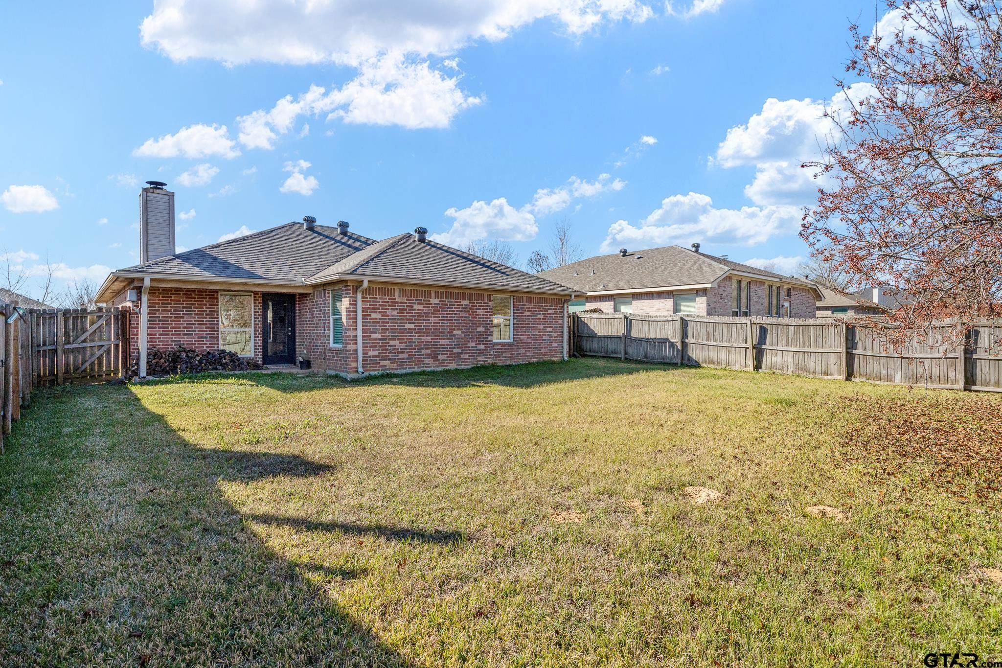 7000 Ranch Hill Drive Flint, TX 75762 - Photo 24 of 25 a front view of a house with a garden