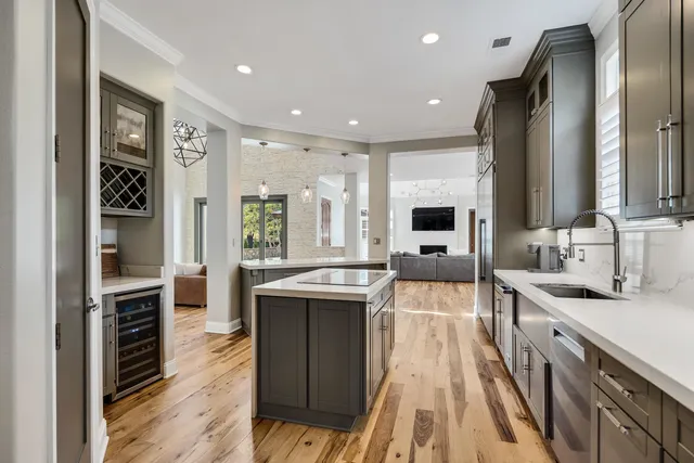 a view of a dining room with furniture and a rug