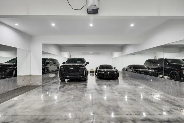 a view of a workspace with furniture and a living room