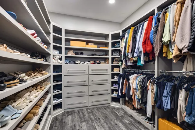a spacious bathroom with a double vanity sink mirror double and bathtub