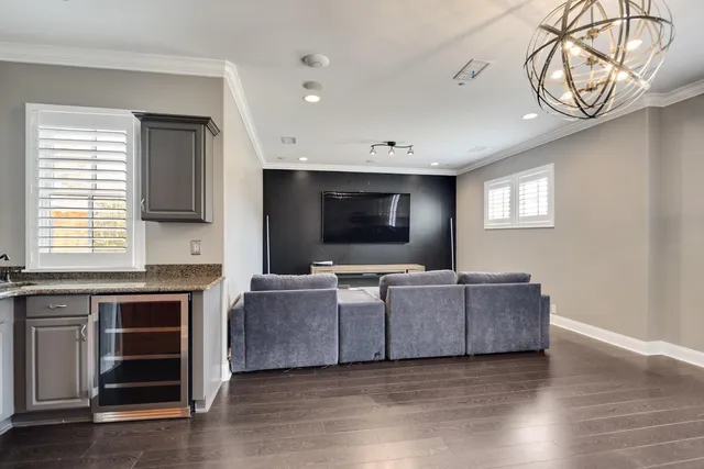 a spacious bedroom with a bed and window