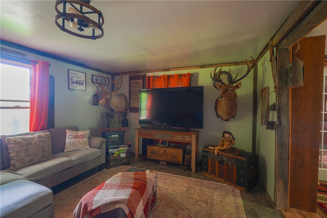 3356 Joe McMahon Road Birdsall, NY 14822 - Photo 46 of 50 Seasonal Cabin Living Room Alternate View