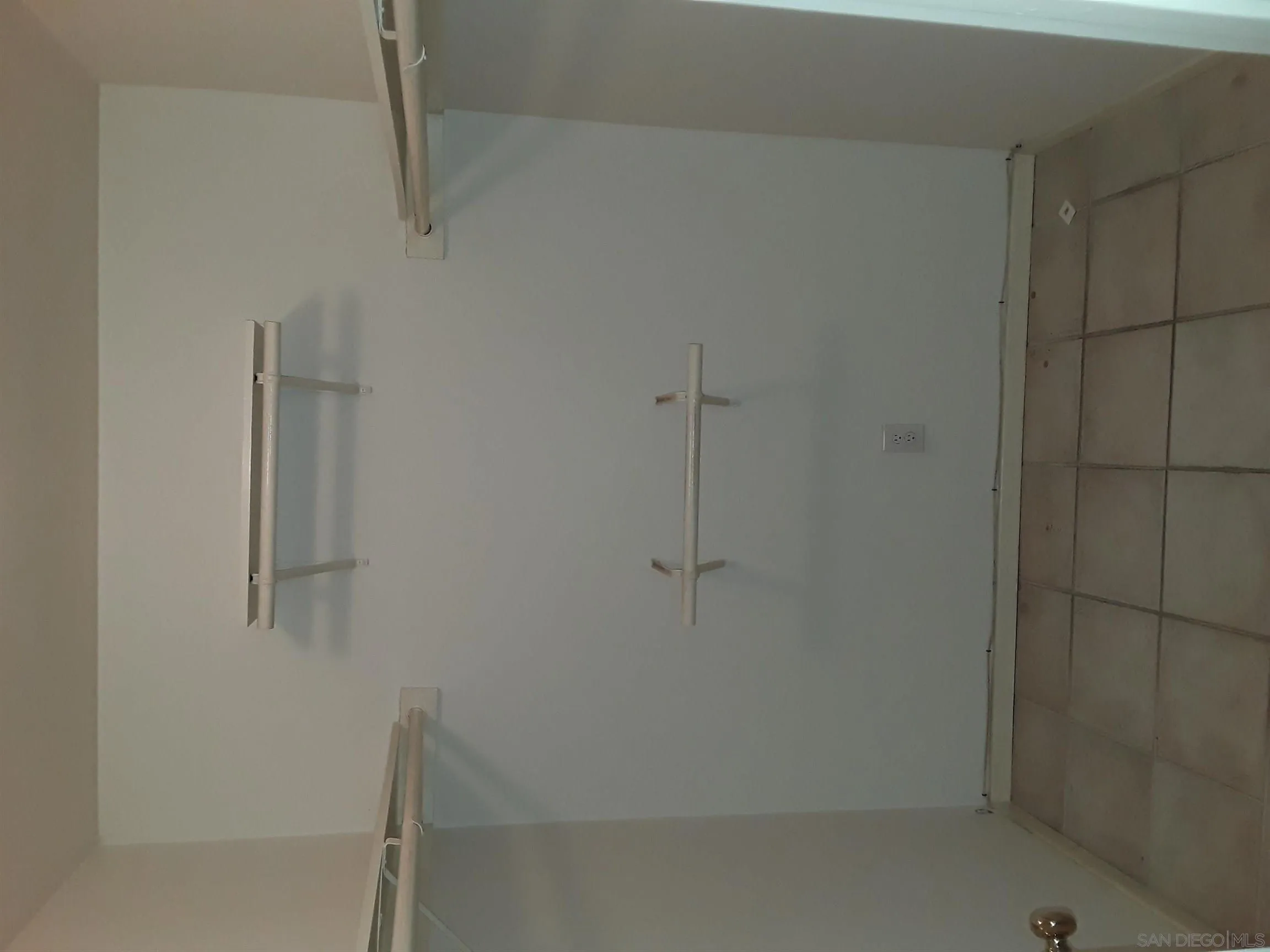 5142 Providence Road San Diego, CA 92117 - Photo 12 of 18 a bathroom with a shower