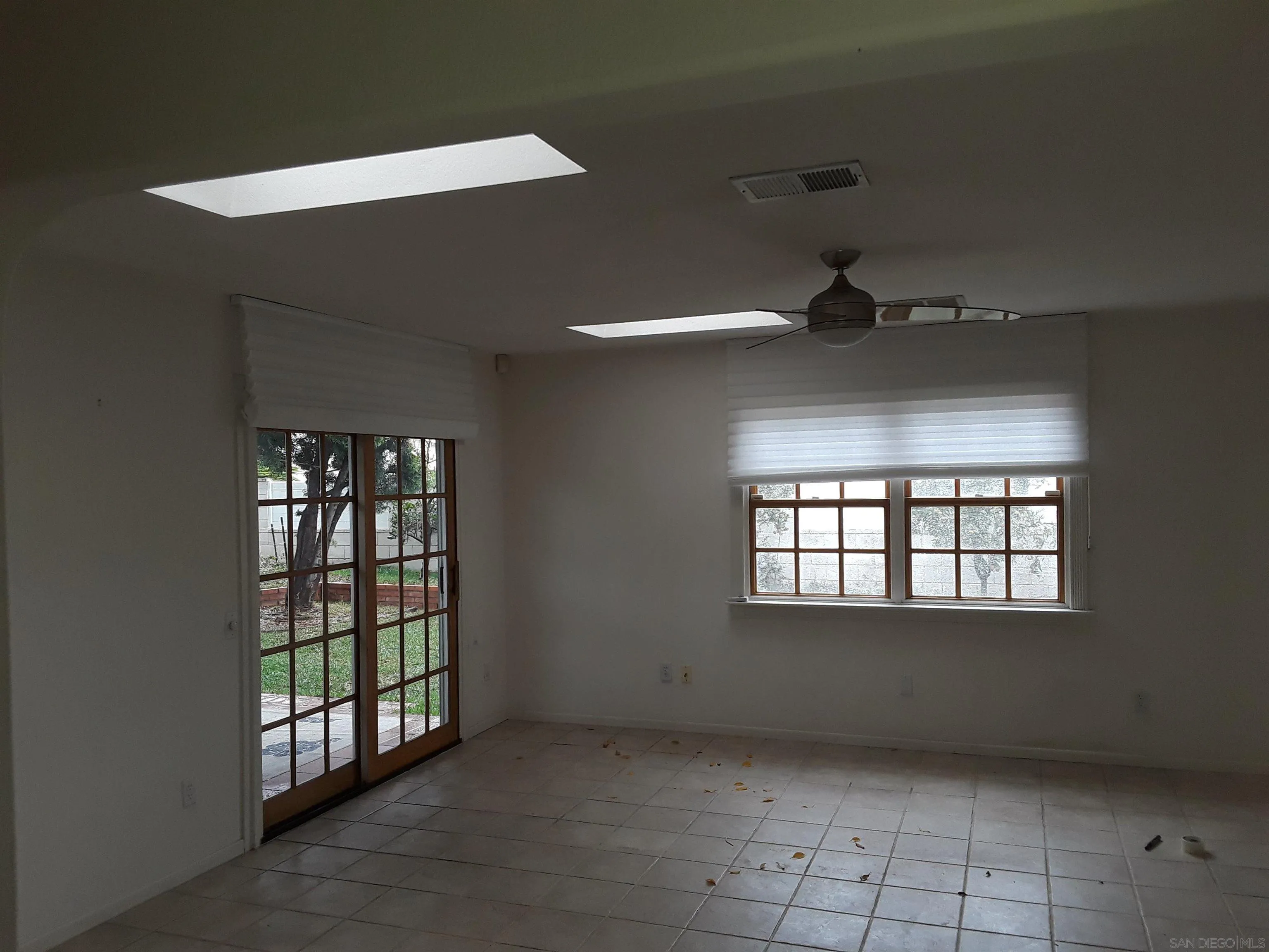 5142 Providence Road San Diego, CA 92117 - Photo 14 of 18 a view of an empty room and window