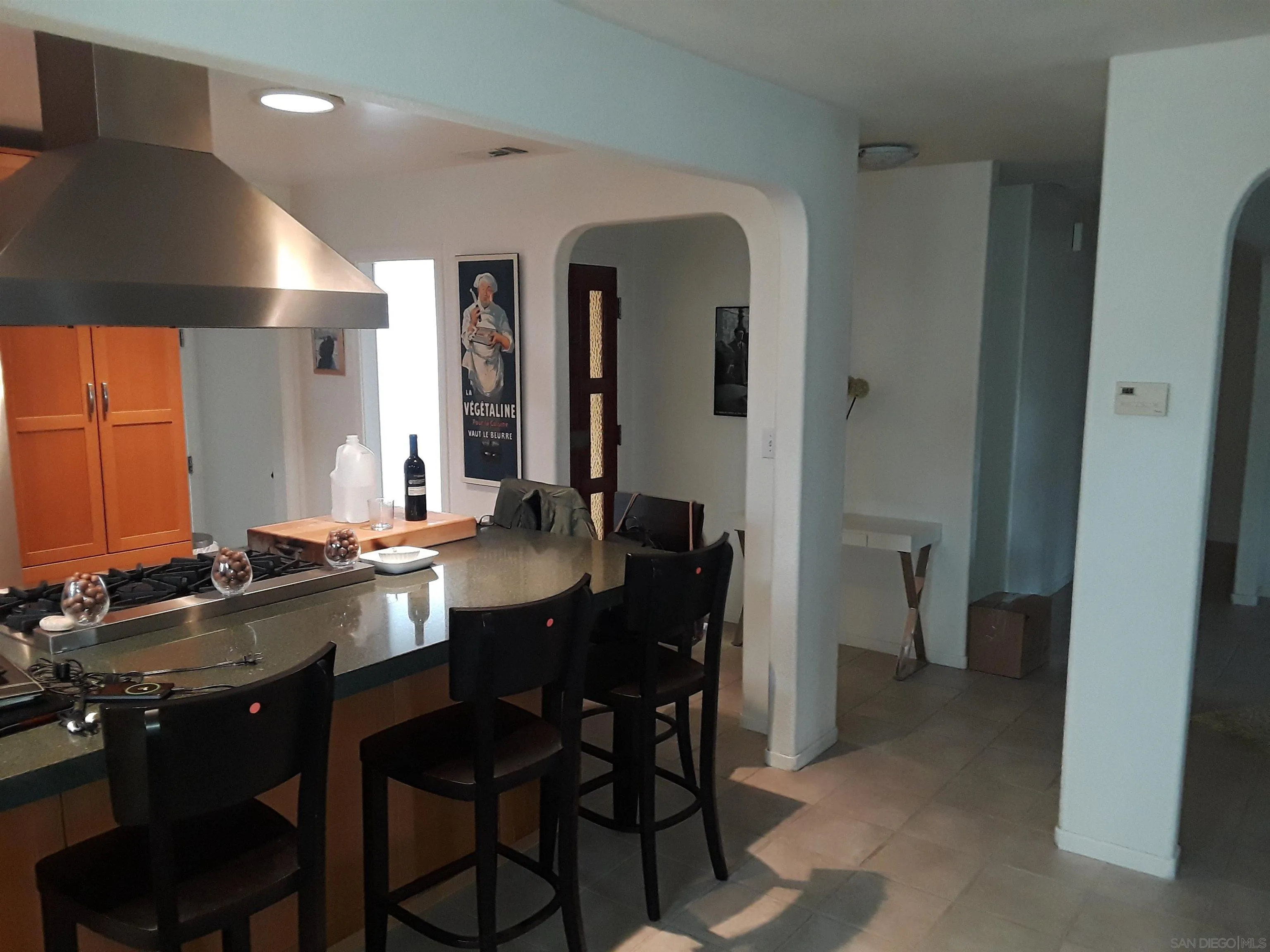 5142 Providence Road San Diego, CA 92117 - Photo 6 of 18 a view of a a dining room with furniture