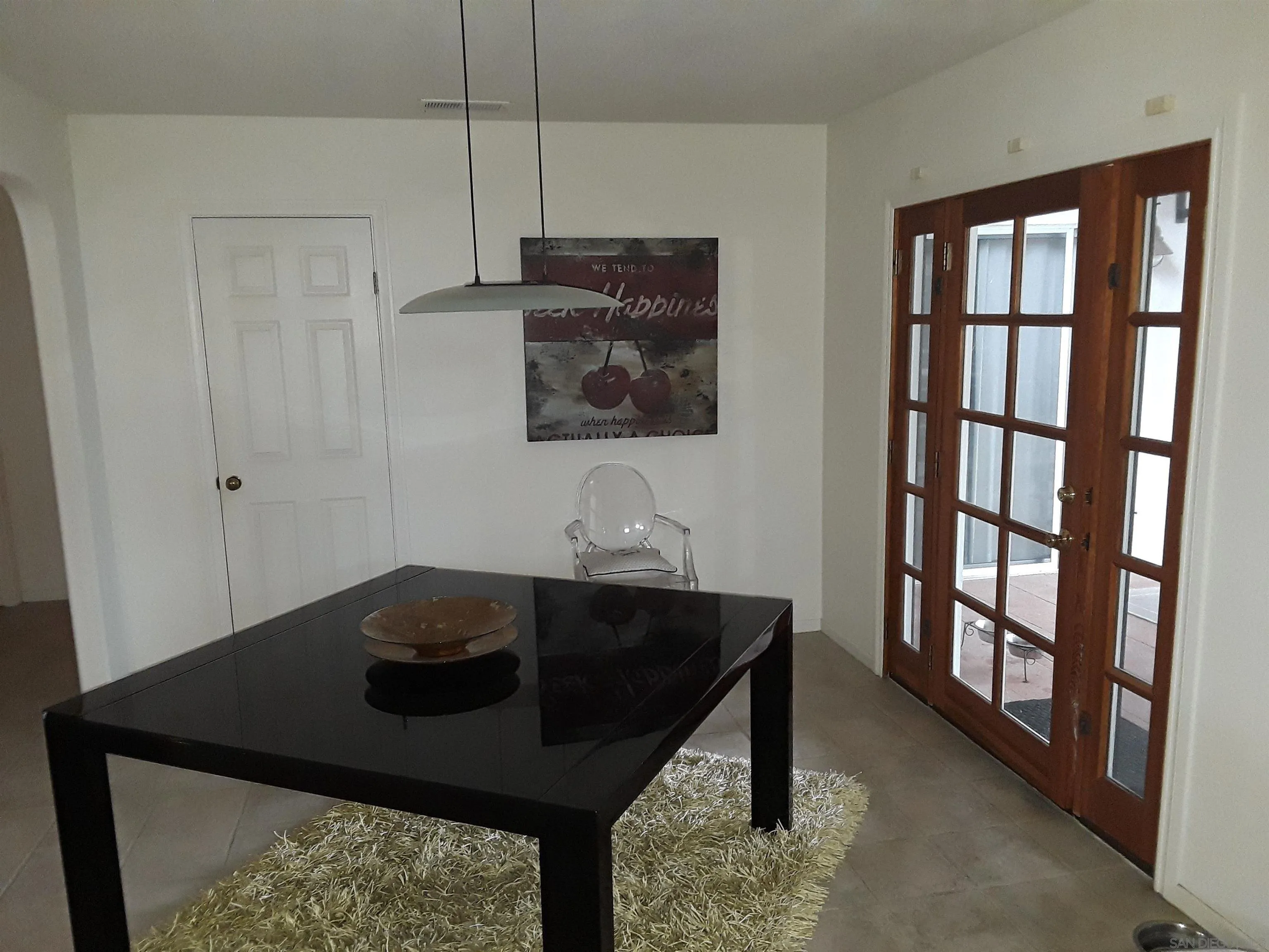 5142 Providence Road San Diego, CA 92117 - Photo 7 of 18 a room with a table and chairs