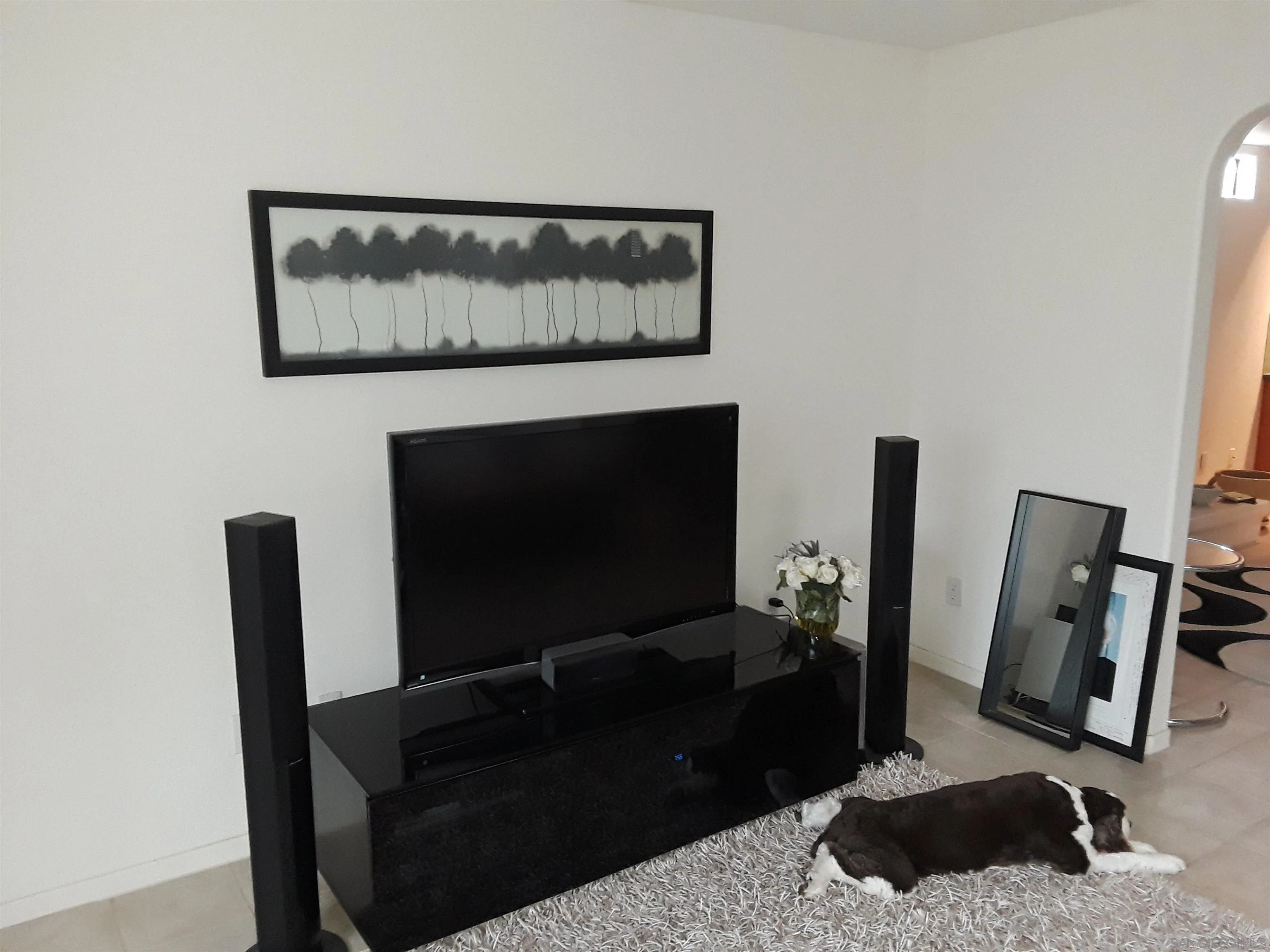 5142 Providence Road San Diego, CA 92117 - Photo 8 of 18 a living room with furniture and a flat screen tv