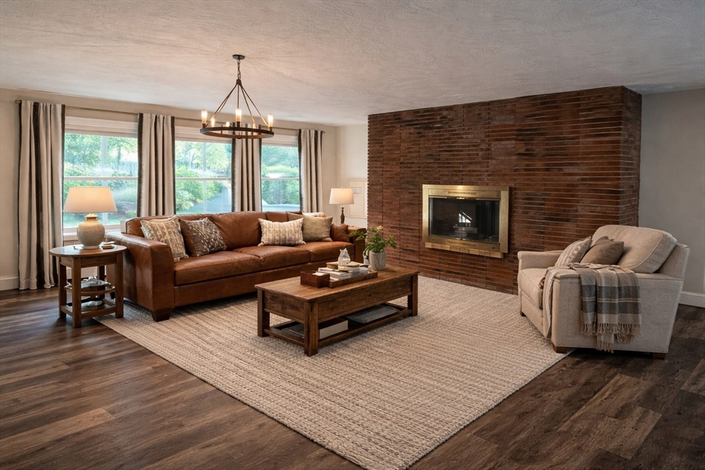 172 Brigham Hill Road Grafton, MA 01536 - Photo 5 of 15 a living room with furniture and a fireplace