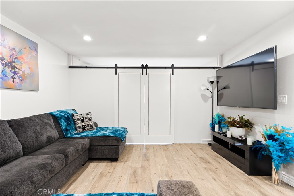 7740 Redlands Street Playa del Rey, CA 90293 - Photo 4 of 14 a living room with furniture and a potted plant