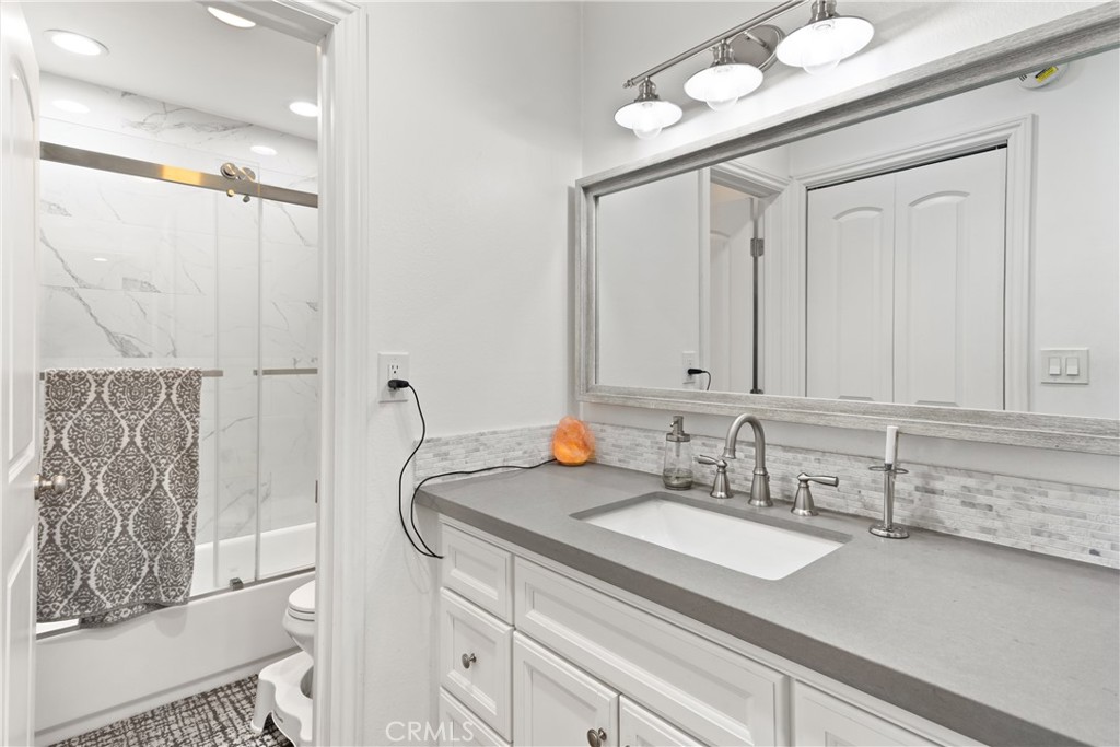7740 Redlands Street Playa del Rey, CA 90293 - Photo 10 of 14 a bathroom with a sink double vanity and a mirror