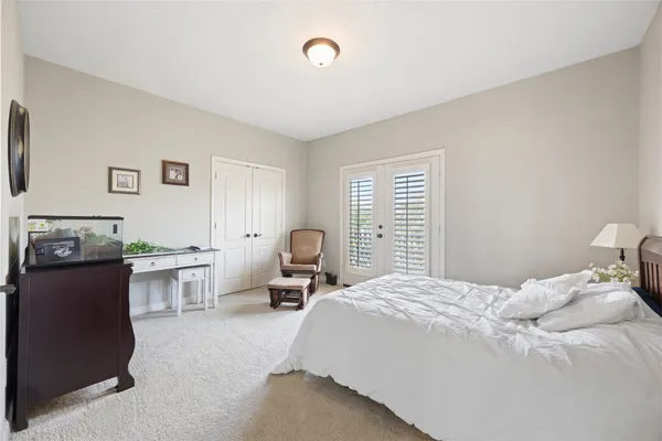 a bedroom with a bed and furniture