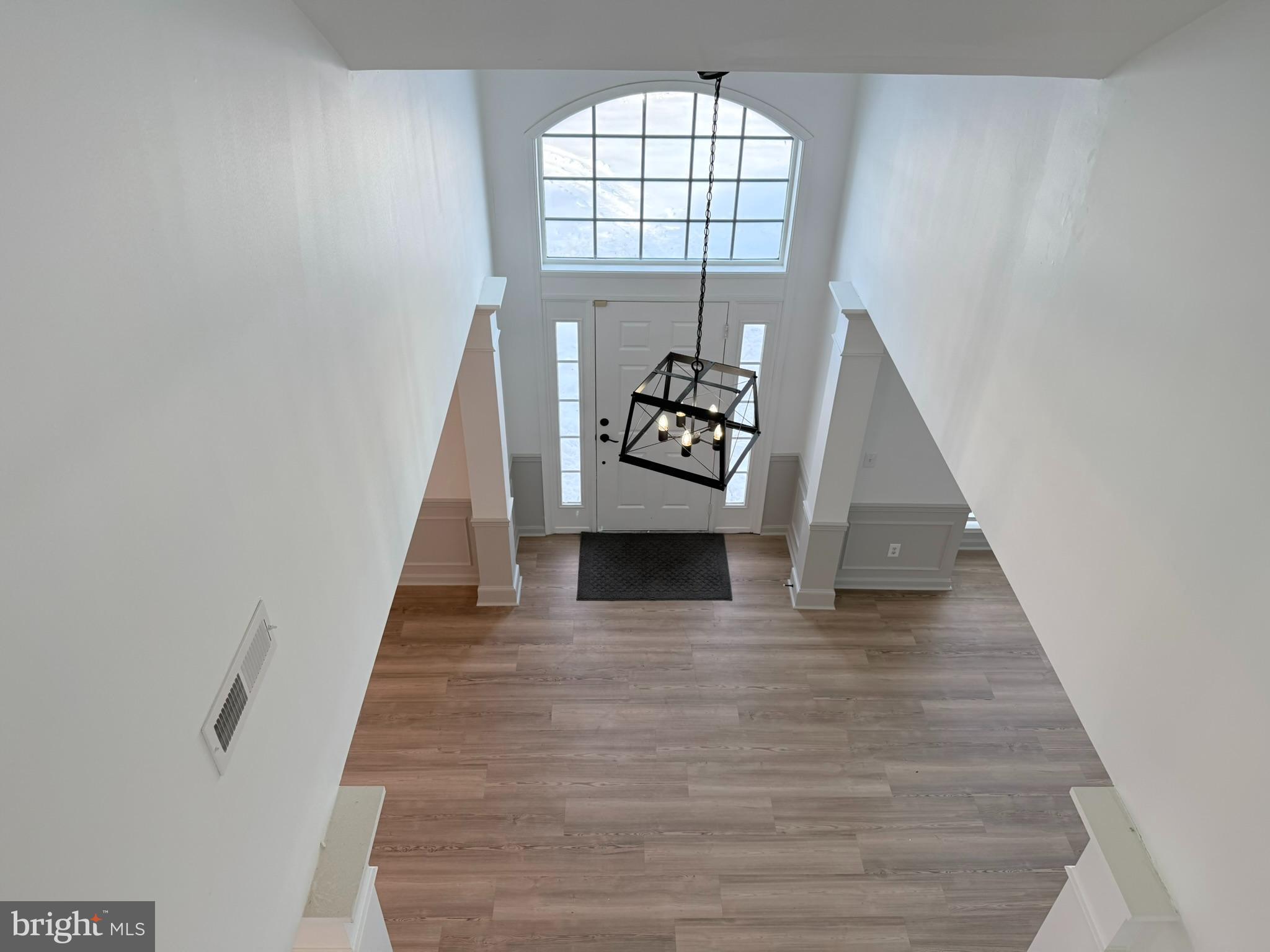 29679 Janets Way Easton, MD 21601 - Photo 20 of 23 a view of entryway and hall with wooden floor