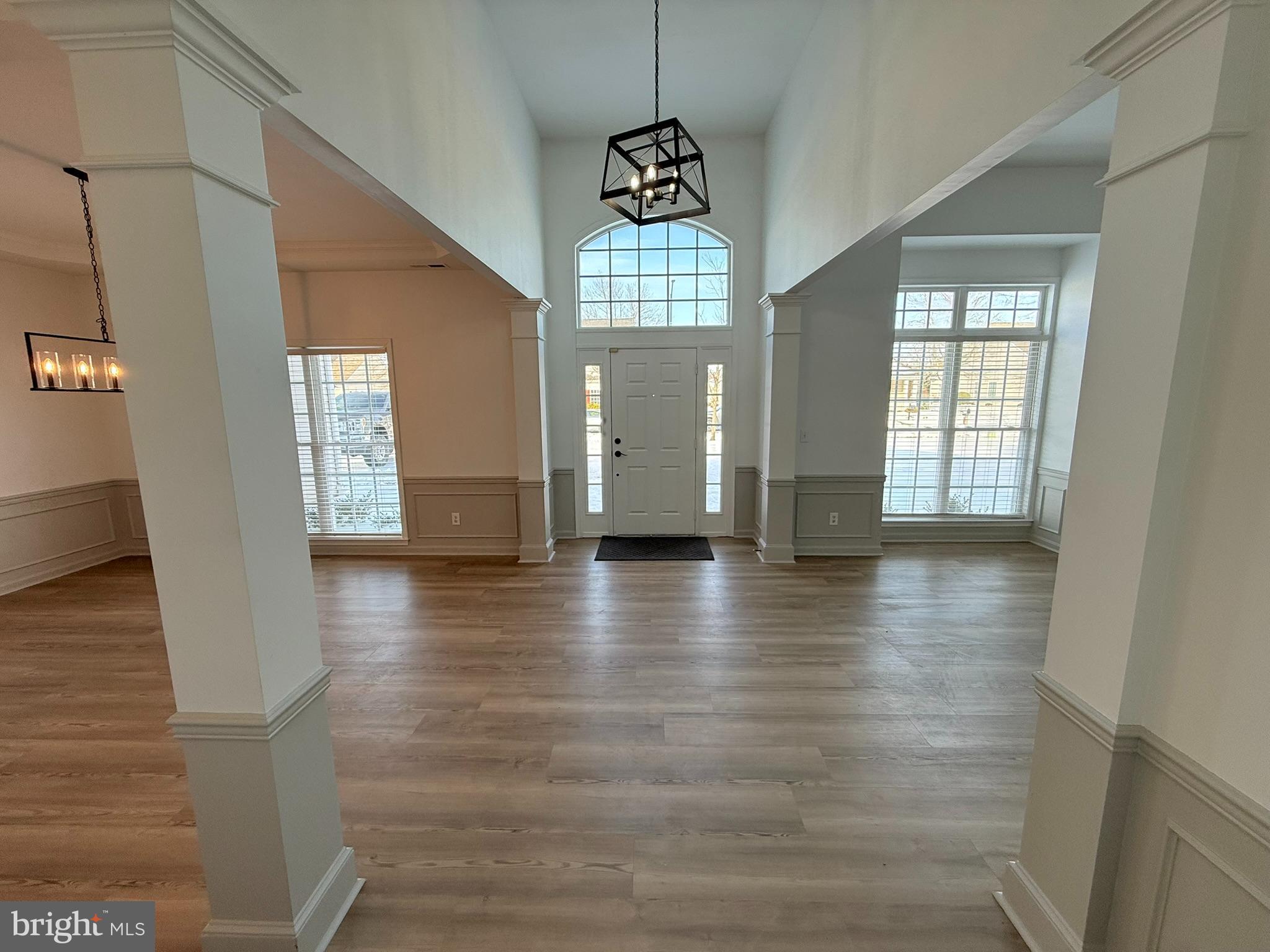 29679 Janets Way Easton, MD 21601 - Photo 7 of 23 a view of an entryway with wooden floor