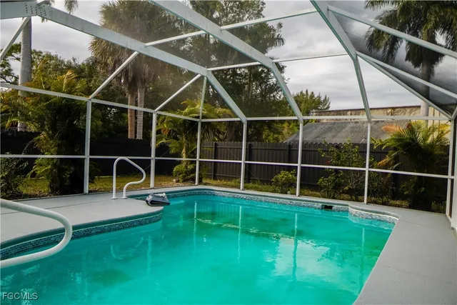 a view of outdoor space with a swimming pool