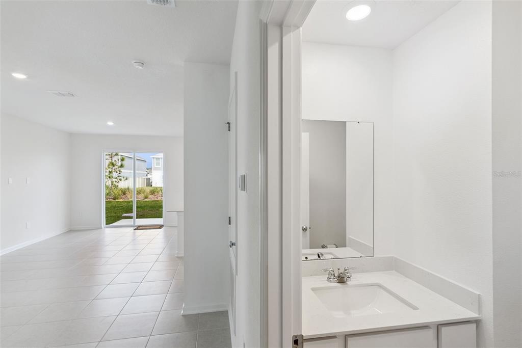 2653 Skyline Loop Kissimmee, FL 34758 - Photo 15 of 42 a view of an empty room with a bathroom