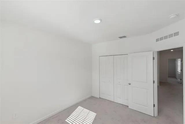 a bathroom with a sink toilet and vanity