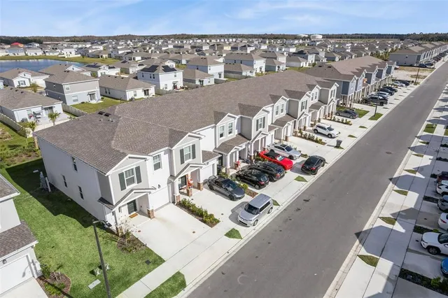 an aerial view of multiple house