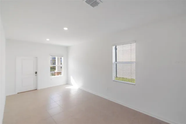 an empty room with windows