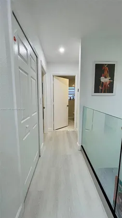 a bed room with a bed and a window