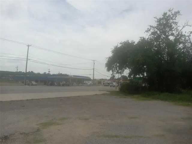 a view of a road and yard