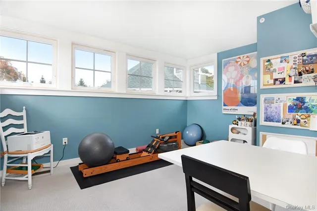 a room with furniture and window