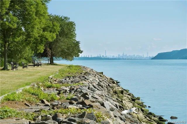 a view of a lake with a big yard