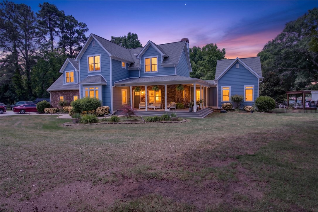 1504 Double Springs Road Townville, SC 29689 - Photo 1 of 41 This welcoming home features a broad front porch, perfect for enjoying twilight evenings.