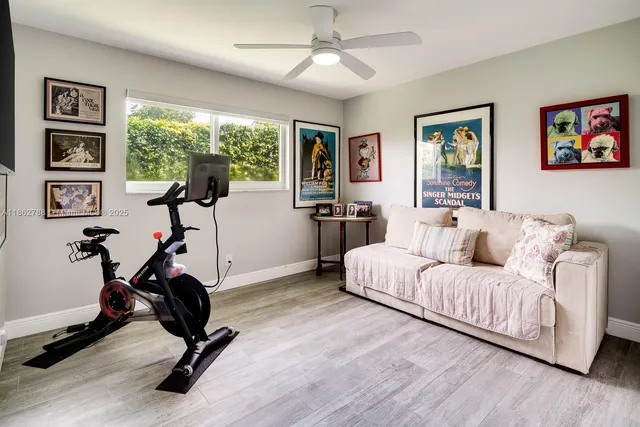 a bedroom with furniture and a window