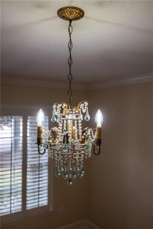 1879 Johnson Road Northeast, Unit 3 Atlanta, GA 30306 - Photo 23 of 38 a view of a chandelier in a house
