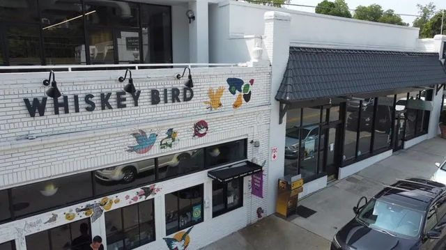 a close view of a two chairs in the balcony