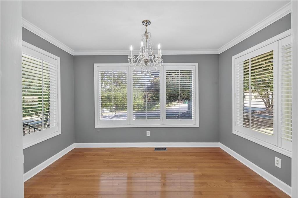 1879 Johnson Road Northeast, Unit 3 Atlanta, GA 30306 - Photo 7 of 38 a view of an empty room with a window