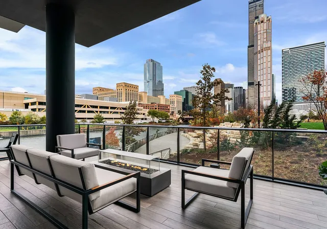 a view of a balcony with chairs