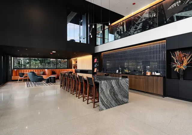 a view of a chairs and tables in a patio