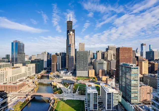 a view of city with tall buildings