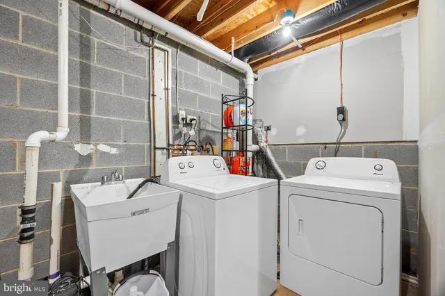 a utility room with dryer and washer